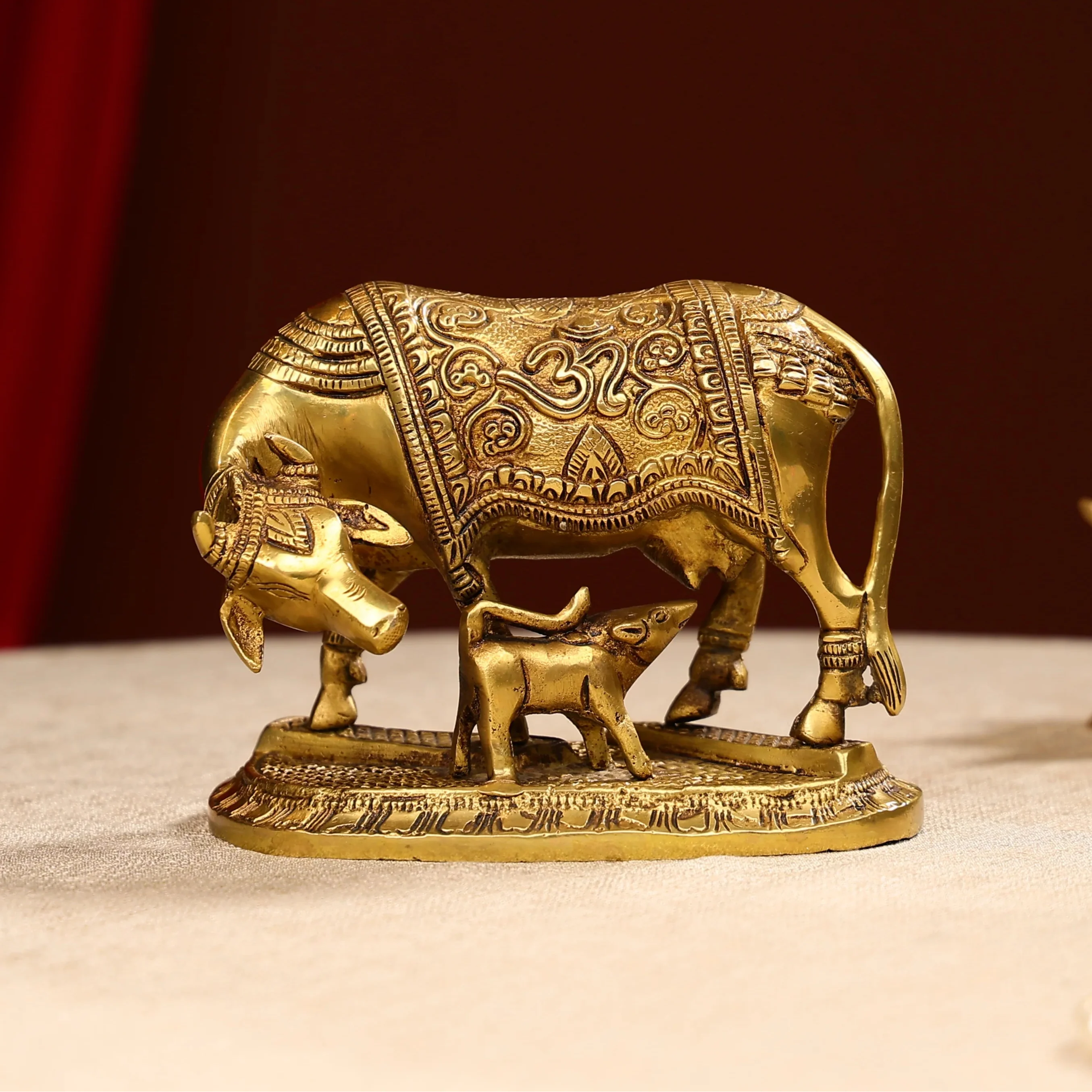 Brass Cow And Calf With Om Sign Carved