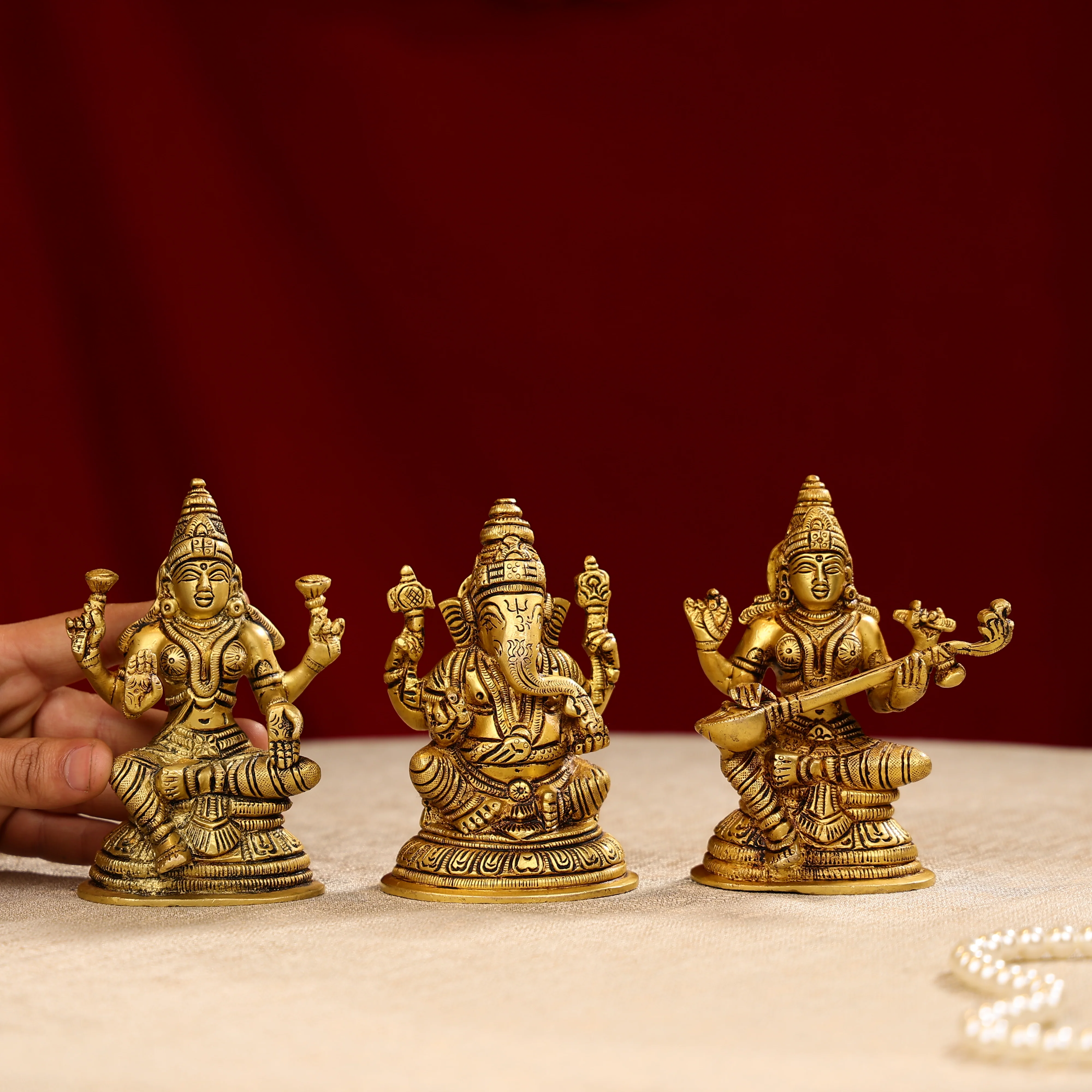 Brass Lord Ganesh Sculpture Sitting On A Pedestal - Image 2