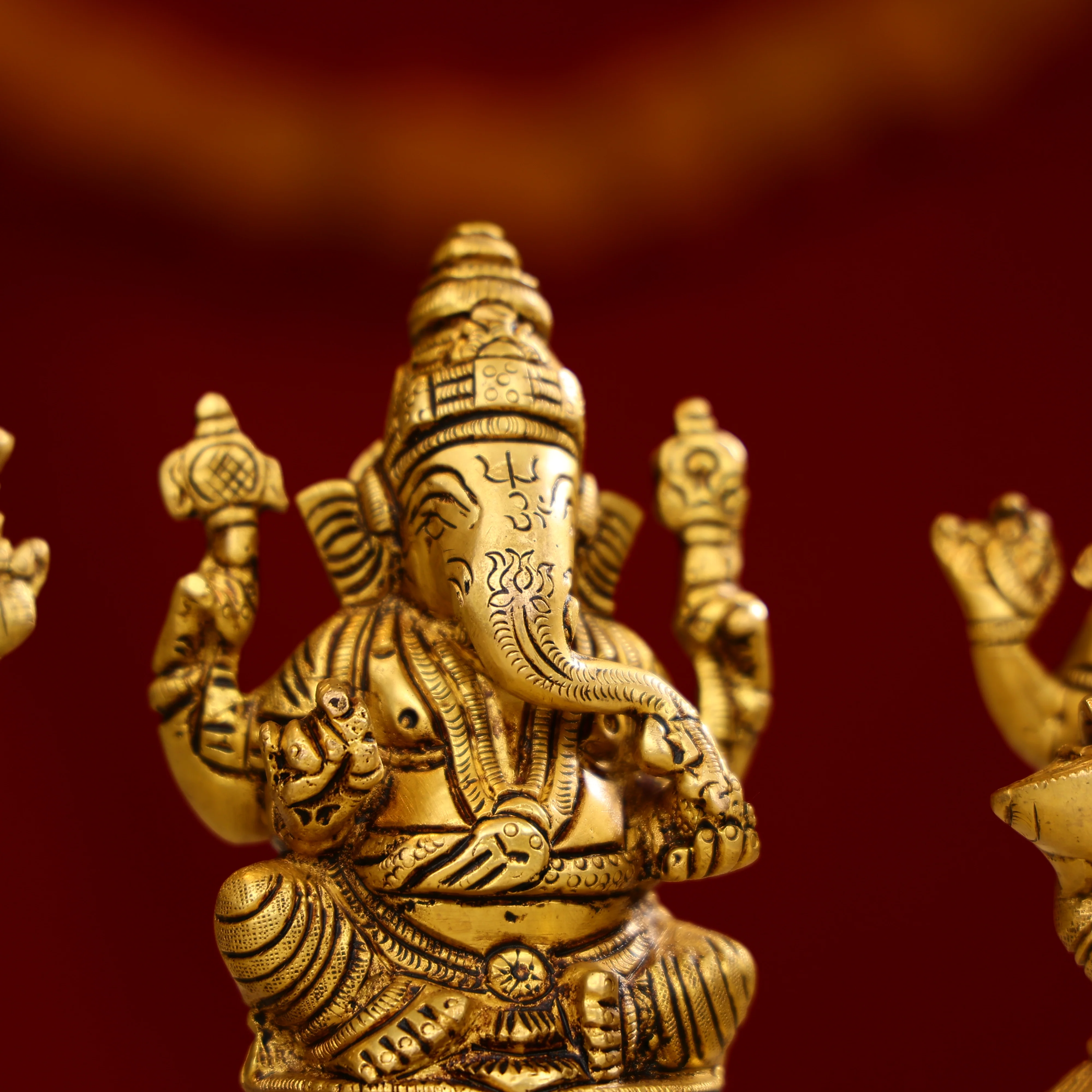 Brass Lord Ganesh Sculpture Sitting On A Pedestal - Image 3